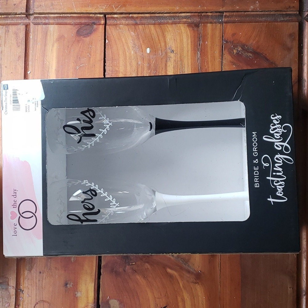 Bride and groom toasting glasses